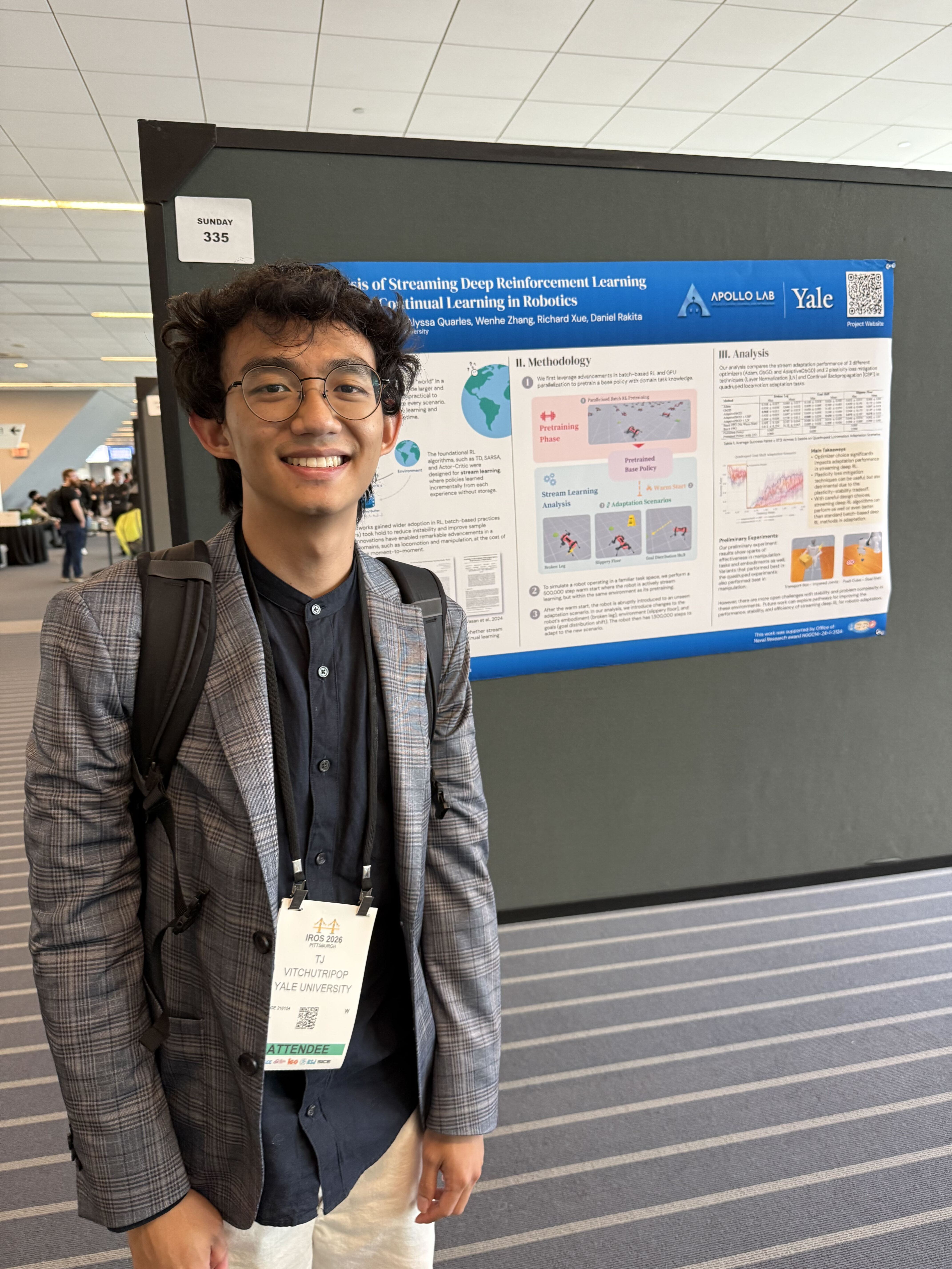 TJ Vitchutripop with the streaming reinforcement learning poster at the LTP workshop.